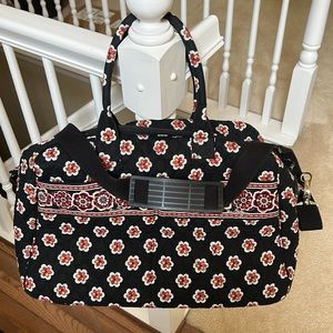 Vera Bradley Weekender travel bag in Pirouette pattern.